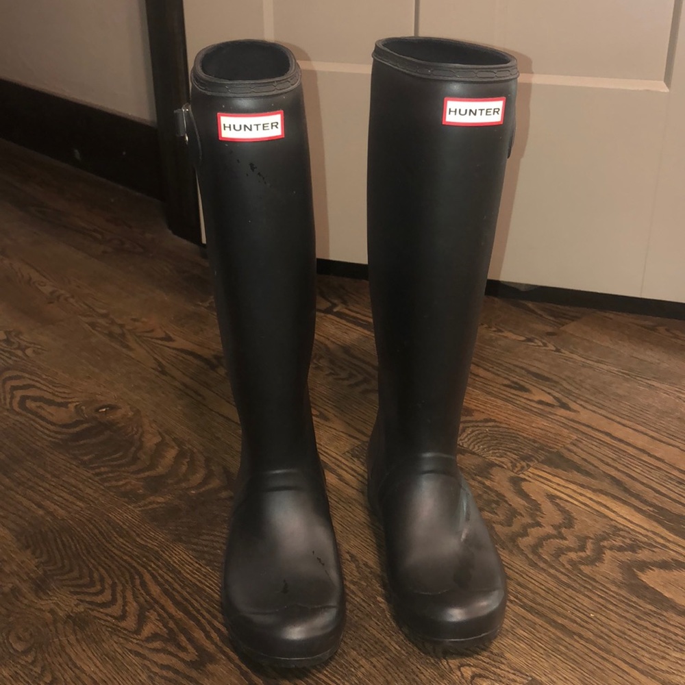 Barley worn black hunter boots